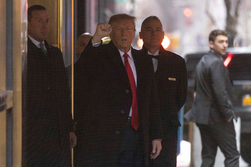 Donald Trump leaves his apartment building en route for the trial in New York (AP Photo/Yuki Iwamura)