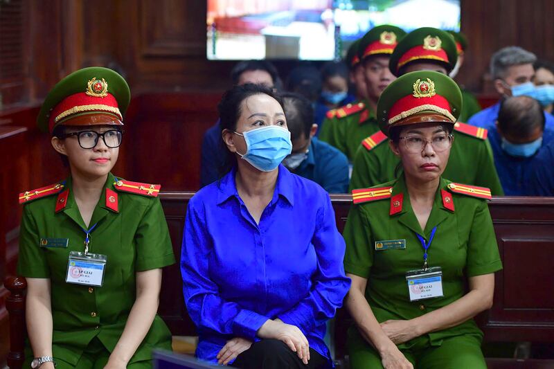 Business woman Truong My Lan, centre, attends her second trial in Vietnam’s largest fraud case in Ho Chi Minh City, Vietnam (Thanh Tung/AP)