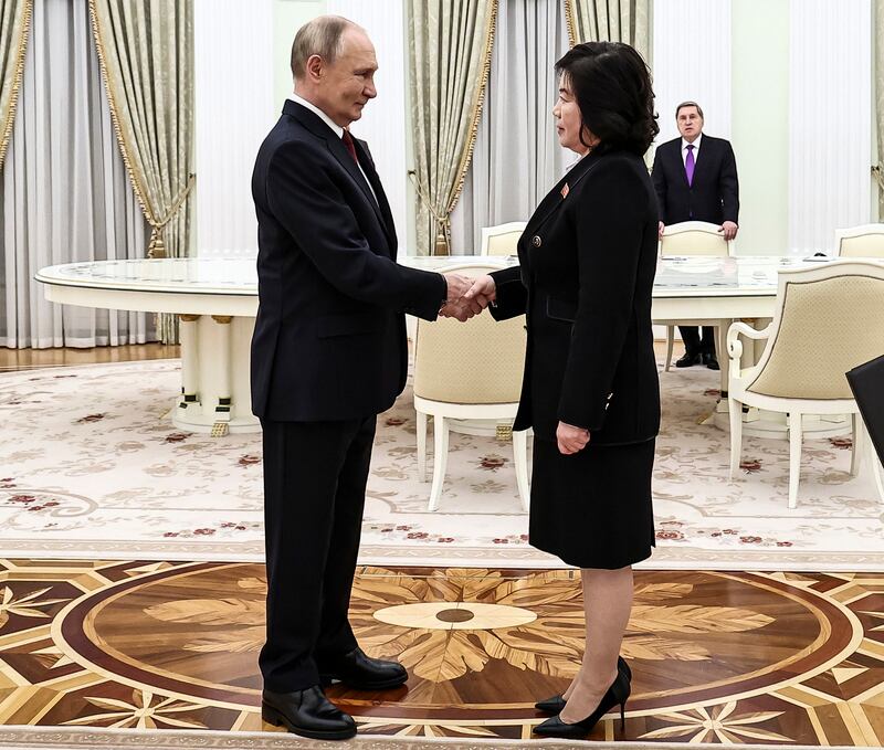 Vladimir Putin greets North Korean foreign minister Choe Son Hui during their meeting at the Kremlin (Mikhail Tereshchenko, Sputnik, Kremlin Pool Photo via AP)