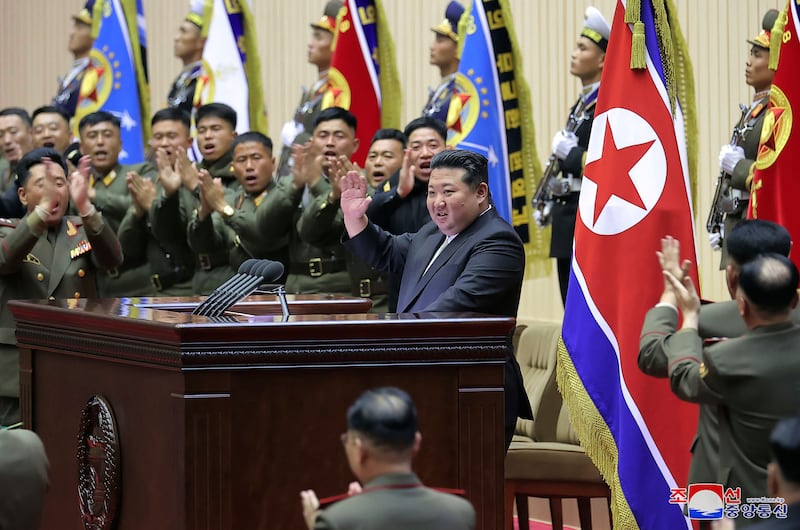 Kim Jong Un, centre, attends a meeting in Pyongyang (KCNA/Korea News Service via AP)