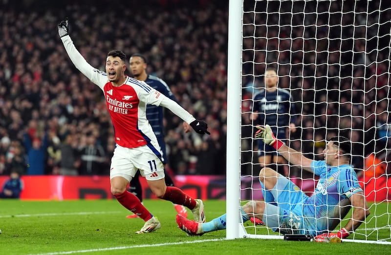 Aston Villa goalkeeper Emiliano Martinez fails to stop Gabriel Martinelli from scoring Arsenal’s first goal