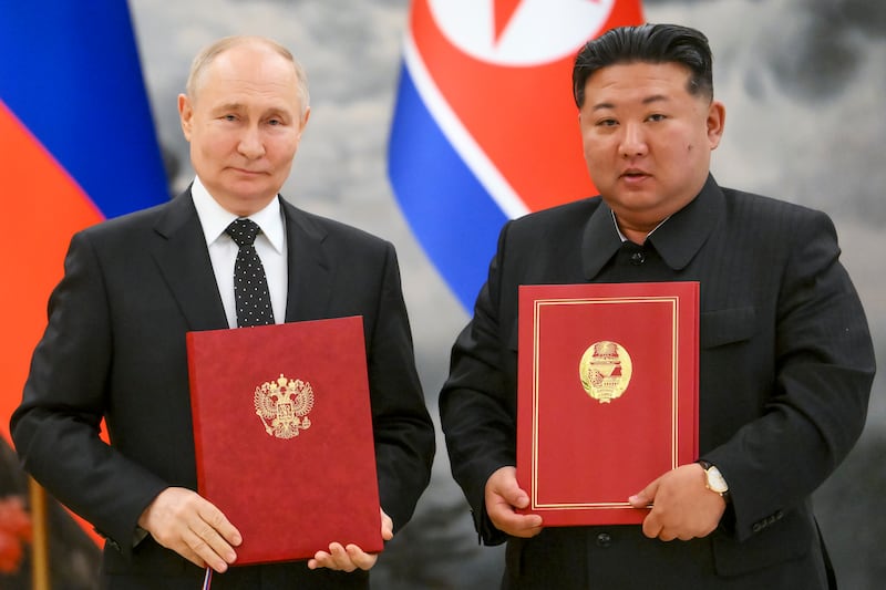 Russian president Vladimir Putin, left, and North Korea’s leader Kim Jong Un pose for a photo during a signing ceremony of the new partnership in Pyongyang, (Kristina Kormilitsyna, Sputnik, Kremlin Pool Photo via AP)