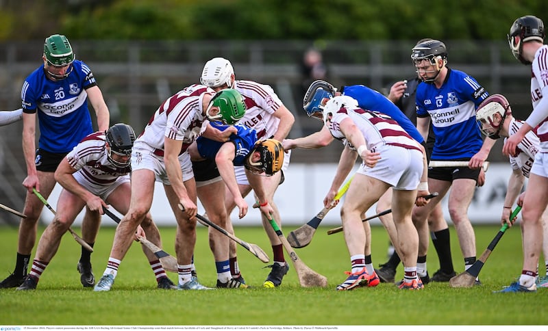 A battle for the ball during the All-Ireland Senior Club Championship semi-final match between Sarsfields of Cork and Sleacht Neill in Newbridge. Photo by Piaras Ó Mídheach/Sportsfile