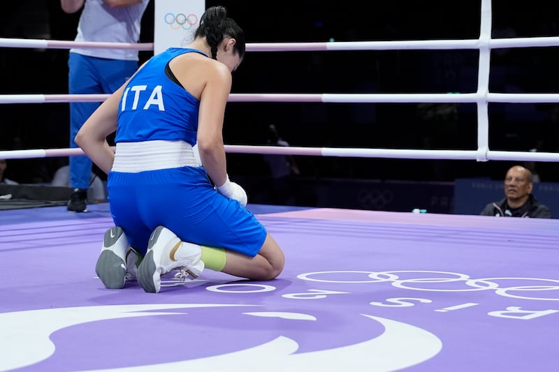 Italy’s Angela Carini pictured in floods of tears after the match