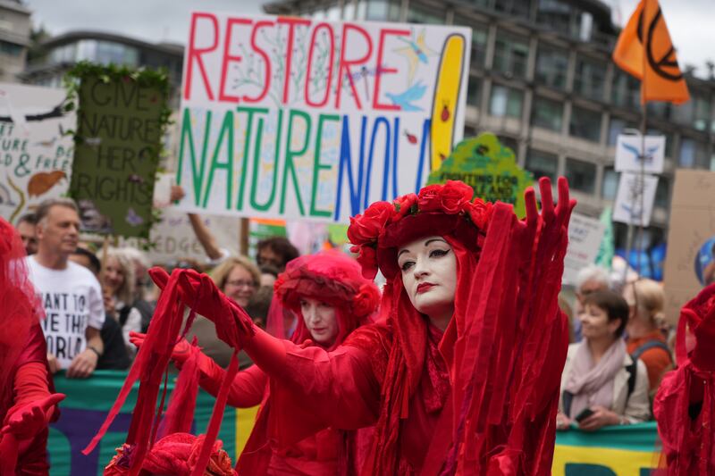 Tens of thousands of people marched through London on Saturday to call for action on the environment