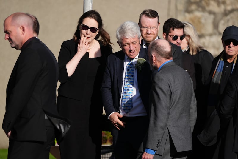 Former Commons Speaker John Bercow, centre, was among the mourners