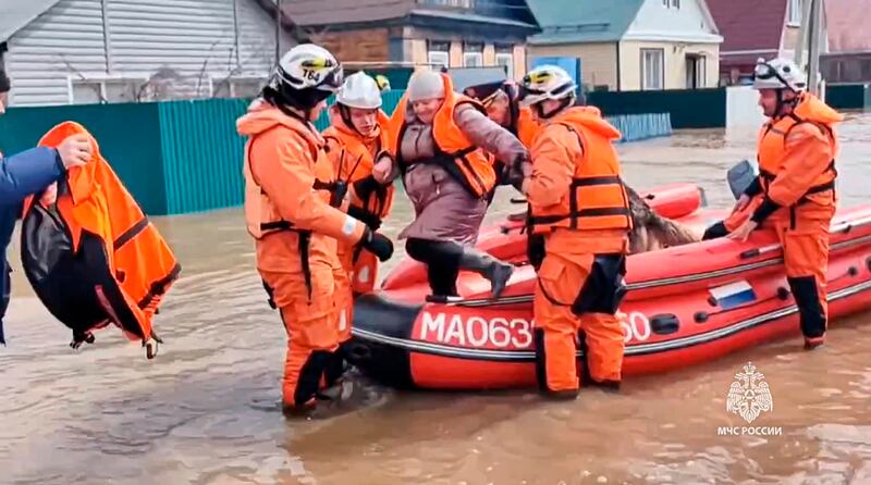 The floods, caused by rising water levels in the Ural River, have forced more than 4,000 people to evacuate (Russian Emergency Ministry Press Service/AP)