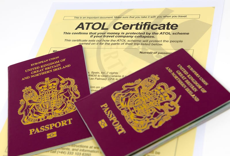 Two U.K. passports with a ATOL certificate