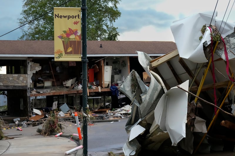 A flood-damaged building and debris left by Hurricane Helene is seen in Newport