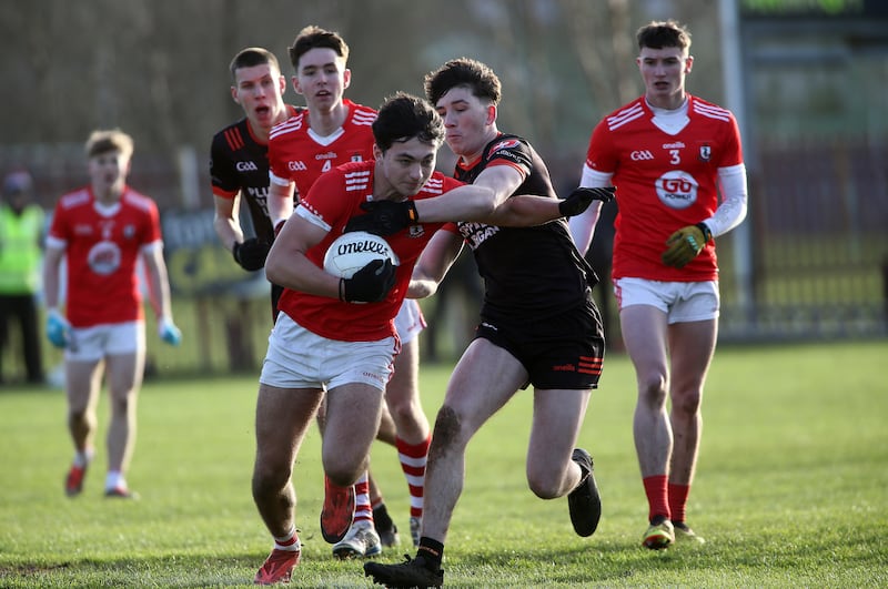 Clann Eireann's Sean Geoghegan in action with Magherafelt's Lorcan Higgins in the Ulster Minor Semi Final game at St Pauls GAC