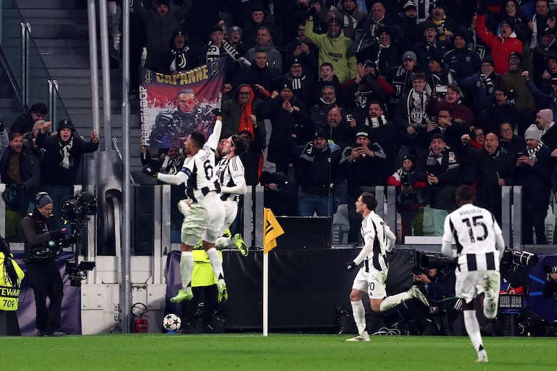 Juventus’ Dusan Vlahovic celebrates scoring the opener