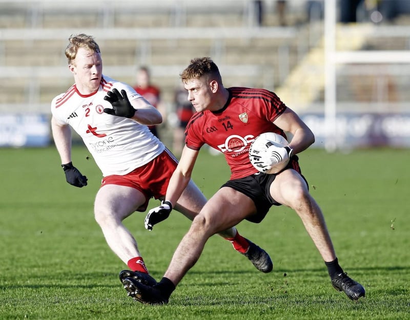 Down&#39;s Pat Havern on the attack against Tyrone&#39;s Hugh Pat McGeary. Pic Philip Walsh. 