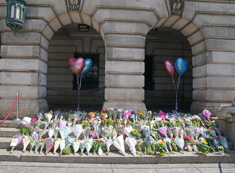 Flowers were left on the steps of Nottingham Council House after the attacks