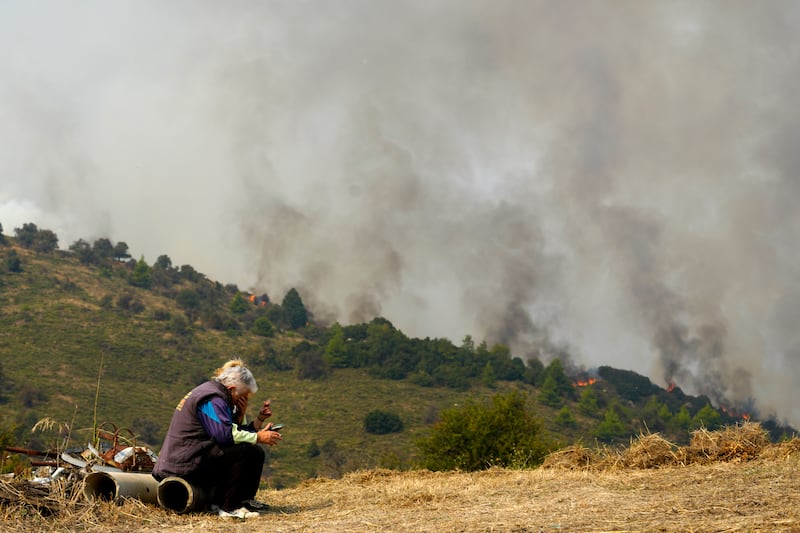 The fire service has had to cope with more than 4,500 wildfires over the past few months (Petros Giannakouris/AP)