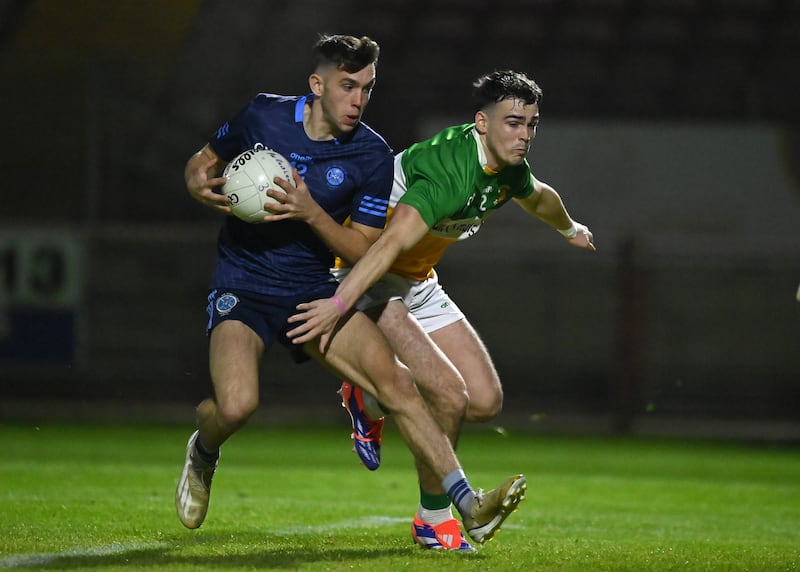 Gavin Potter of Killyclogher in action against Michael McCallan of Carrickmore in the Tyrone GAA Senior Championship Q/F at Healy Park Omagh