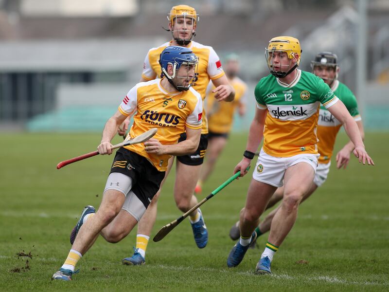 Antrim's Scott Walsh looks to get away from Offaly's Killian Sampson during their Allianz National Hurling League Division 1B game in Tullamore