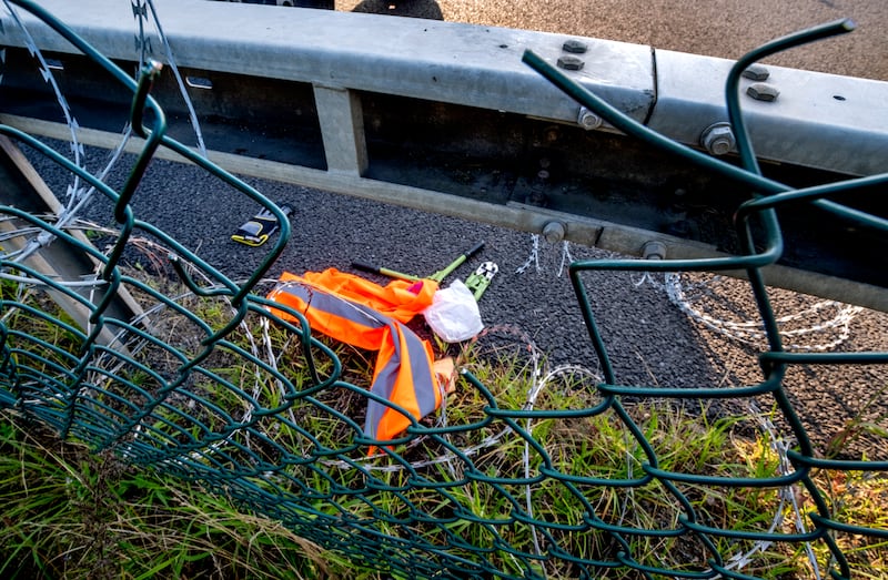 Equipment left behind after a hole was cut in a fence (Michael Probst/AP)