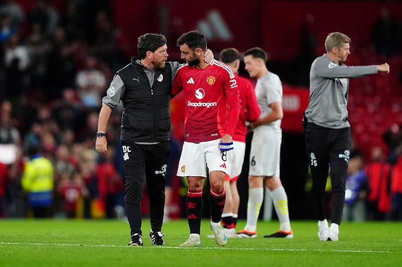 Barnsley manager Darrell Clarke, left, was a boyhood Manchester United fan