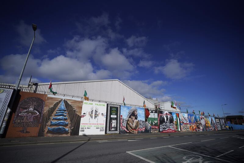 Murals on the International Wall in west Belfast in March 2024