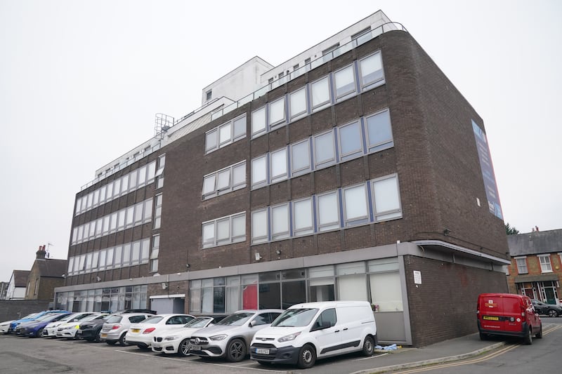 A view of Imtech House on Woodthorpe Road in Ashford, Surrey, where a woman in her 20s died and a two-year-old girl was found with serious injuries