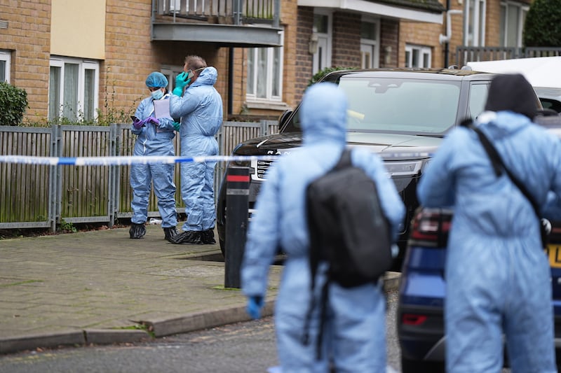 Police forensic officers at the scene