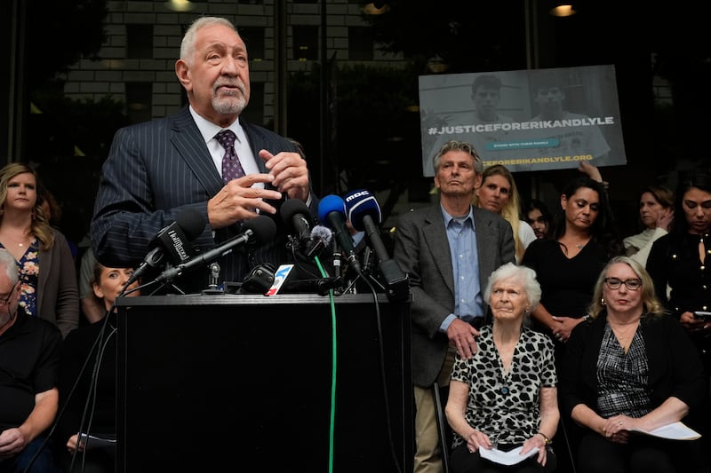 Lawyer Mark Geragos speaks in front of members of the Menendez family during a press conference (Damian Dovarganes/AP)