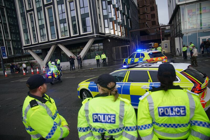 Police escort a prison van believed to contain Axel Rudakubana arriving at Liverpool Crown Court