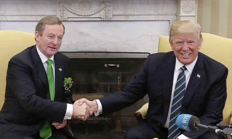 President Donald Trump and Taoiseach Enda Kenny meet for talks in the Oval Office of the White House in Washington, March 16, 2017. Photo Niall Carson/PA Wire. 