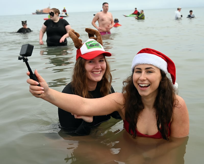 Hundreds of people took the plunge at the Boxing Day Tenby swim