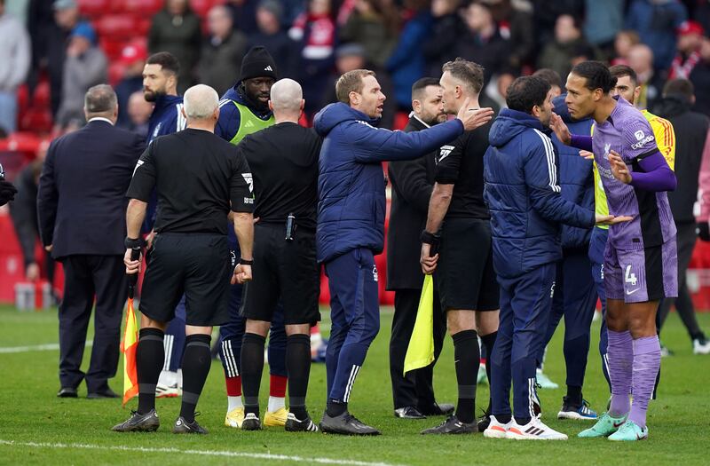 Referee Paul Tierney was surrounded by Nottingham Forest players and staff at the final whistle