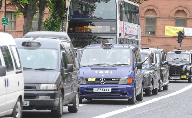 Passengers will be able to hail taxis in Belfast on Friday and Saturday nights from next month. Picture by Alan Lewis 