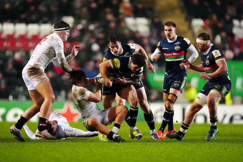 Leicester Tigers' Izaia Perese (centre left) is tackled by Ulster's Aidan Morgan (third left) during the Investec Champions Cup match at Mattioli Woods Welford Road, Leicester. Picture date: Saturday January 11, 2025. PA Photo. See PA story RUGBYU Leicester. Photo credit should read: Mike Egerton/PA Wire.

RESTRICTIONS: Use subject to restrictions. Editorial use only, no commercial use without prior consent from rights holder.