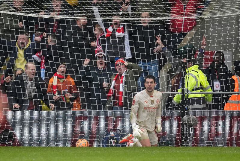 Manchester City goalkeeper Stefan Ortega looks on after turning in an effort from Leyton Orient’s Jamie Donley