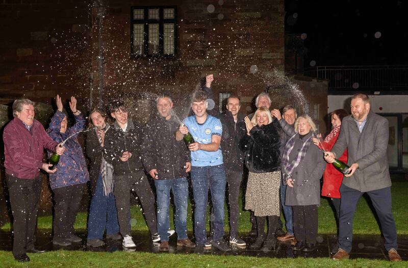 James Clarkson, 20, celebrates winning £7.5m National Lottery jackpot with parents and extended family. (Pic Anthony Devlin)