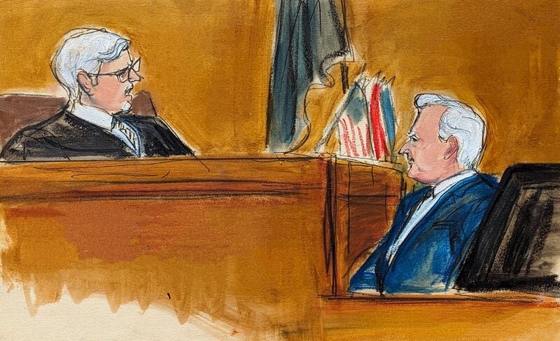 Judge Juan Merchan, left, castigates witness Robert Costello about his ‘decorum’ in the courtroom in Manhattan Criminal Court on Monday in New York (Elizabeth Williams via AP)