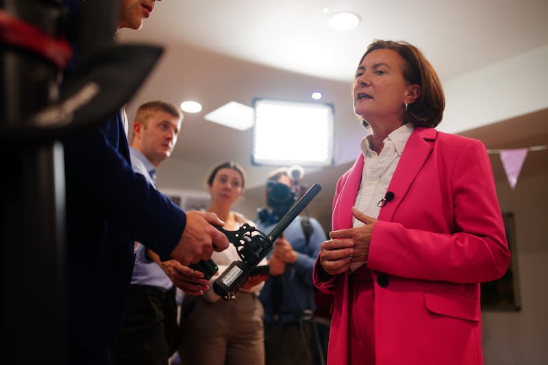 Eluned Morgan speaking to broadcasters at the Caer Heritage Centre in Caerau, Ely