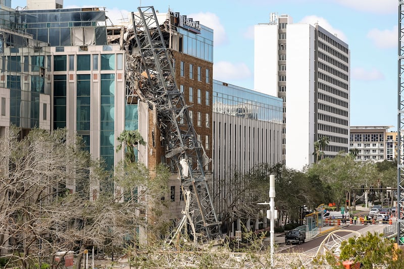 A high rise construction crane broke apart in St Petersburg (Mike Carlson/AP)