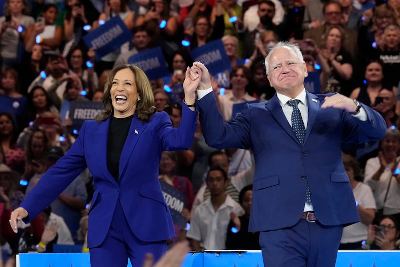 Democratic presidential nominee Vice President Kamala Harris and running mate Minnesota Governor Tim Walz appear at the Fiserv Forum in Milwaukee (Jacquelyn Martin/AP)