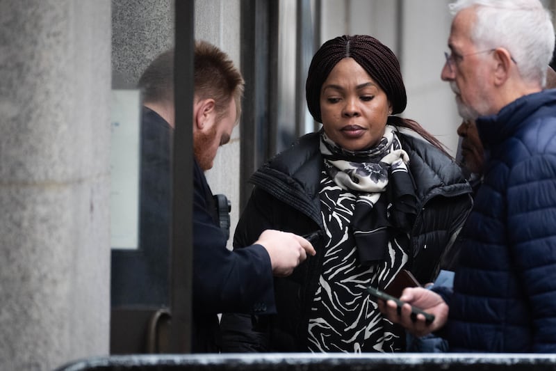 Helen Lumuanganu, the mother of Chris Kaba, arriving at the Old Bailey, central London