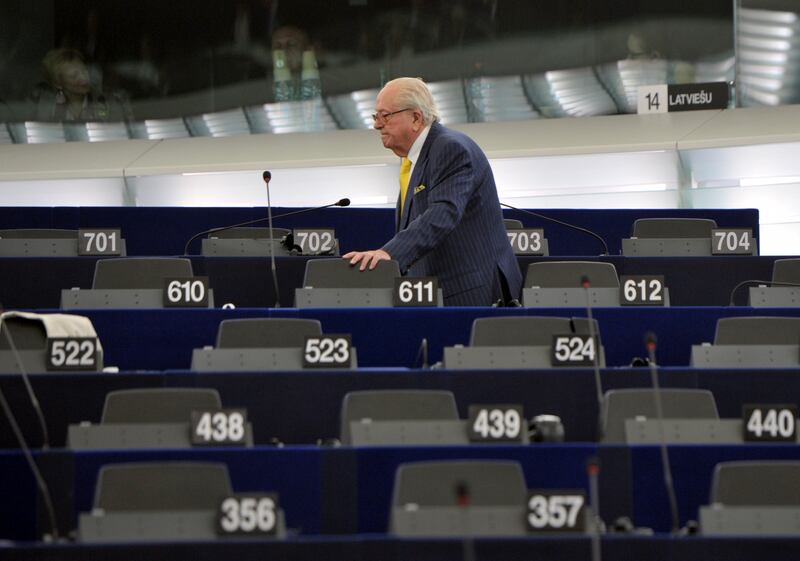 Jean Marie Le Pen looks for his seat at the European Parliament in 2014 (Christian Lutz/AP)