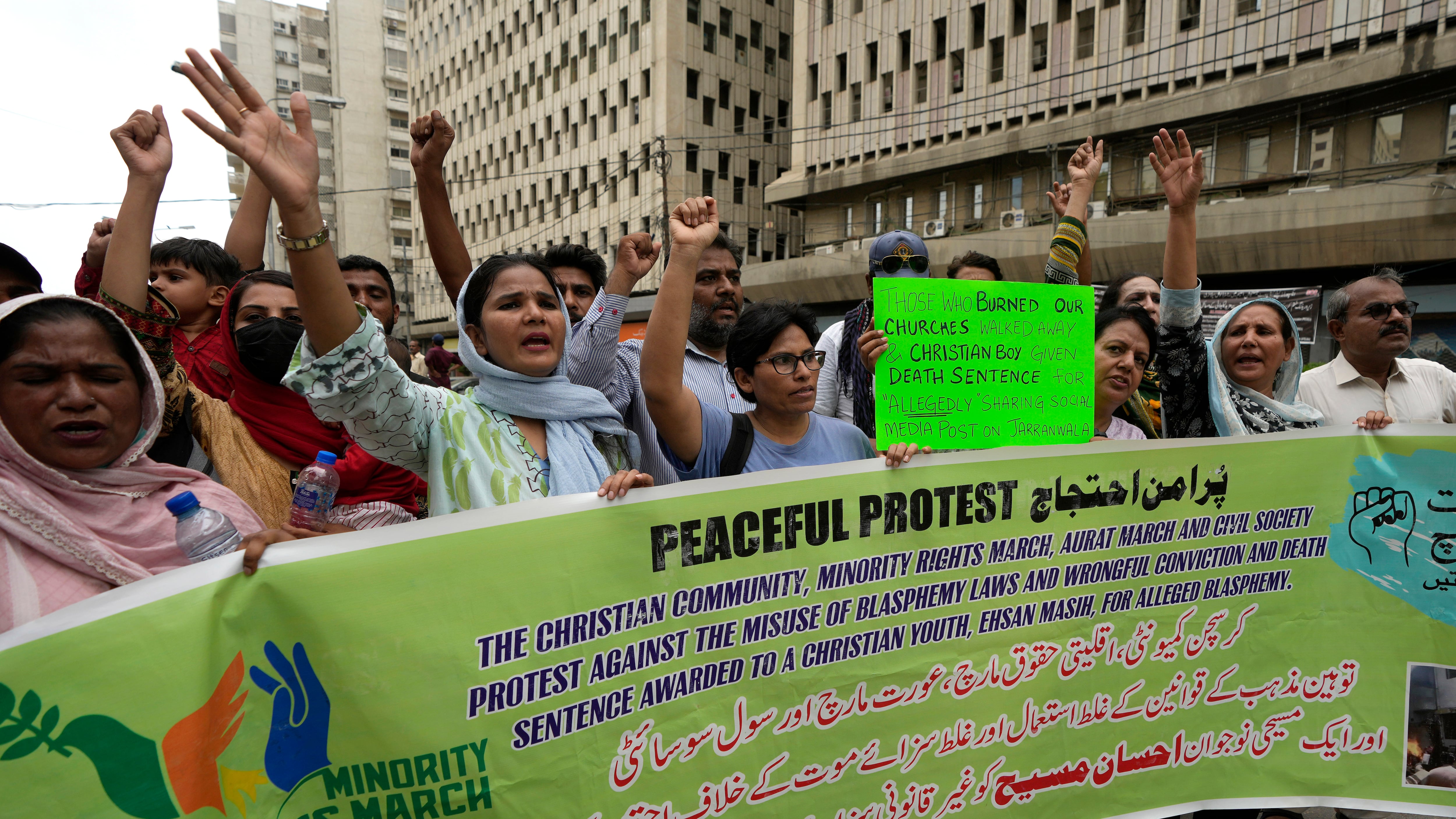 Members from Pakistan’s minority community and civil society chant slogans during a demonstration against the conviction of a Christian man on charges of blasphemy and to condemn the country’s blasphemy laws (Fareed Khan/AP)