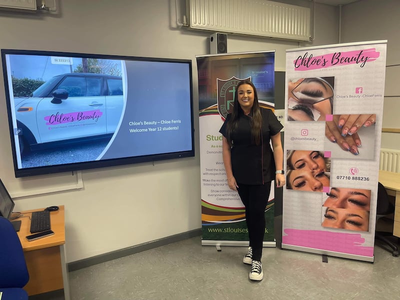 Chloe Ferris delivering a talk to students at St Louise's about the success of her beauty business