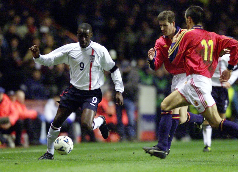 Andy Cole (left) made 15 appearances for England between 1995-2001