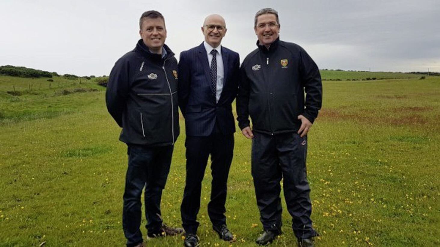 Down County Board chairman Sean Rooney (right) and Down GAA treasurer Diarmuid Cahill (left) with Colm McGurk of McGurk Chartered Architects back in June