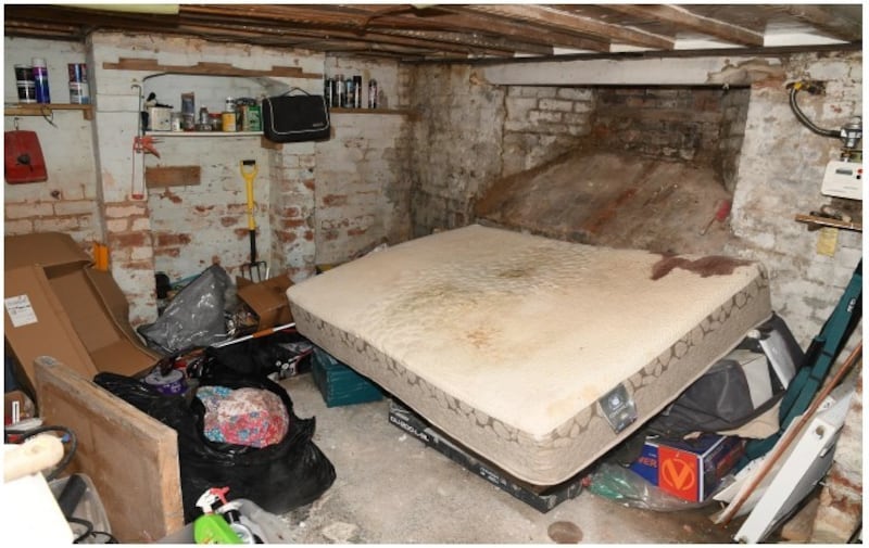 A bloodstained mattress was found in the basement