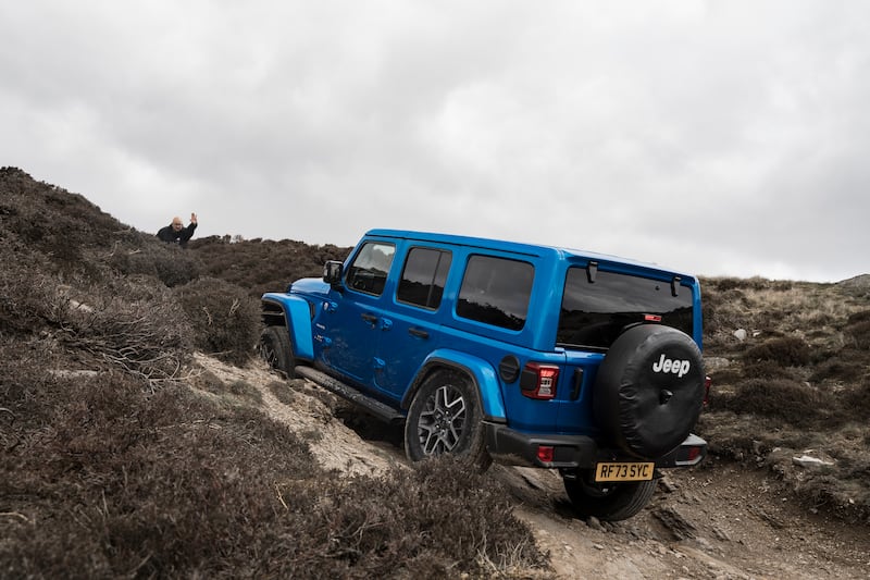 The Wrangler gets a full four-wheel-drive system