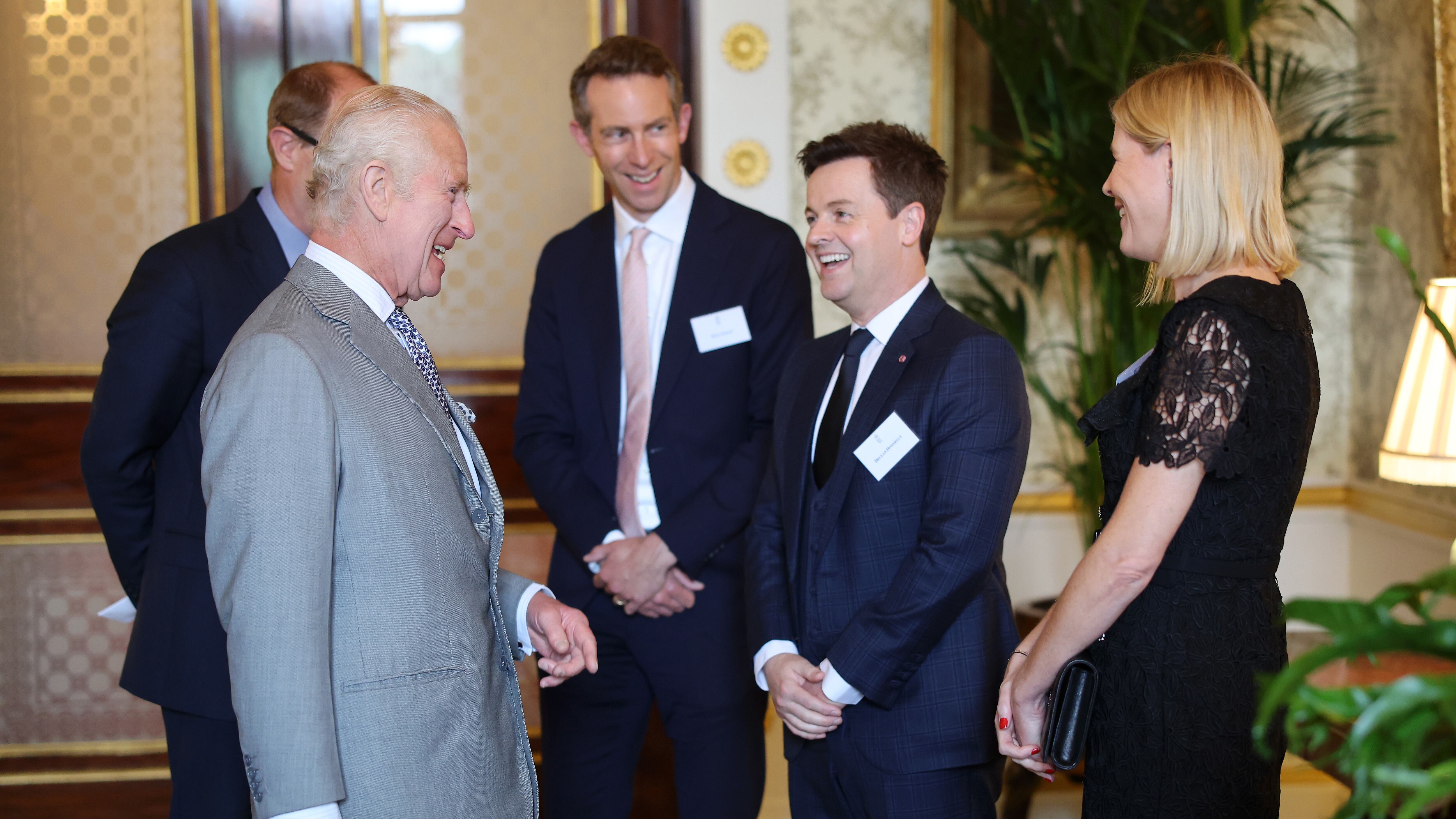The King meets Declan Donnelly and Ali Astall during a reception for Prince’s Trust Award 2024 winners, supporters and ambassadors at Buckingham Palace in London