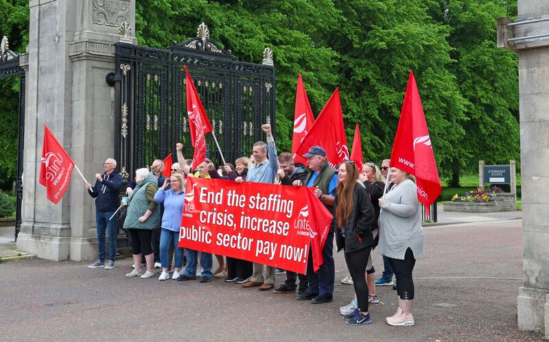 NIPSA Members protest at Stormont on Monday.
Members employed by the Education Authority (non-teaching staff) had an expectation that the long overdue Pay and Grading Review, agreed with employers in 2019, would be addressed within the current Assembly budget.

The deal, which would start to address levels of poverty pay that are endemic to the education sector, was supposed to be included in the new financial package (which formed a key part of the restoration of the N.I. Assembly). Education workers are among the lowest paid in society, with many working multiple jobs to make ends meet and the failure to implement the Pay and Grading review has pushed members further into poverty.

Following meetings with the Education Minister, Paul Givan, and clarification that funding for the review is not available within the budget agreed by Stormont, NIPSA has been left with no option other than to take action to support its members.
As a result, NIPSA, and the other Education trade union members, will take part in co-ordinated industrial action, beginning with school bus drivers who will strike on 20, 21, 22 May and 3, 4 June.

PICTURE COLM LENAGHAN