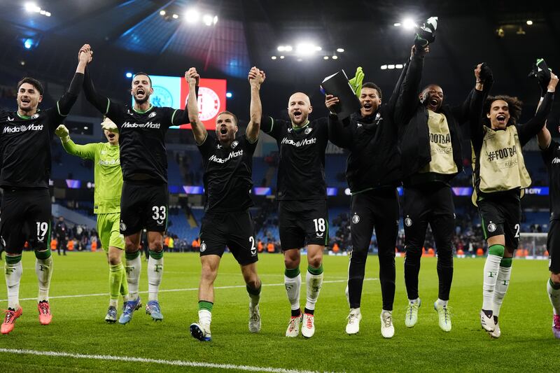 Feyenoord celebrate their draw in front of their fans