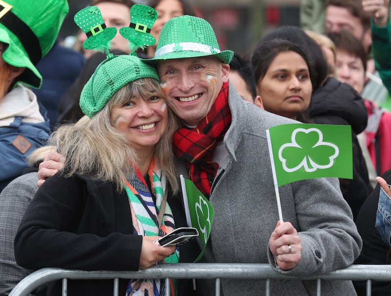 Performers entertain the crowd as  Thousands line the streets for the St Patrick’s day Parade in Belfast on Sunday.
PICTURE COLM LENAGHAN